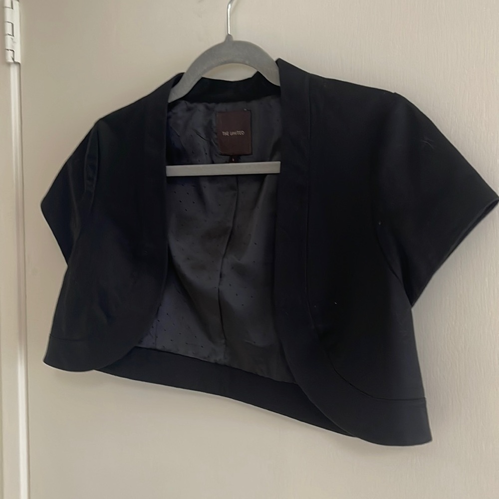 Black, shrug. New, never worn